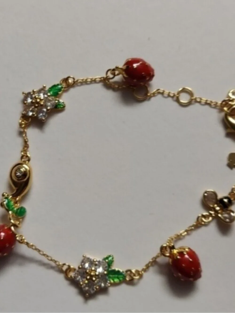 kate spade Gold-Tone Strawberry Charm Bracelet with Red and Green Accents - Picture 8 of 8